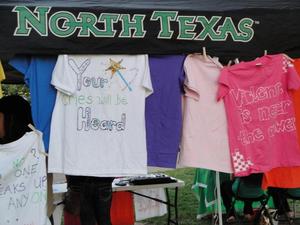 [Shirts on display, 2011 Denton Friends of the Family]