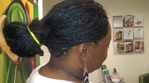 [Woman's braided hair]