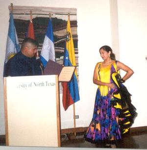 [Speaker and dancer at 2006 award ceremony]