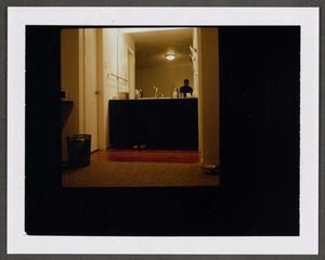 Primary view of object titled '[Byrd Williams IV in a bathroom area]'.