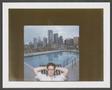 Primary view of [Man laying on a pool chair, rooftop pool in the background]