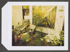 [Painting studio surrounded by paint splatters]