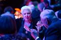 Thumbnail image of item number 1 in: '[A woman conversing with others at the UNT College of Music Gala]'.