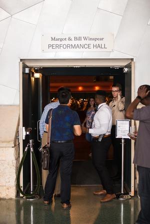 [Individuals entering the performance hall at the UNT College of Music Gala]