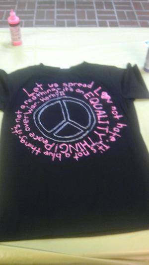 [Message on black Clothesline Project t-shirt]