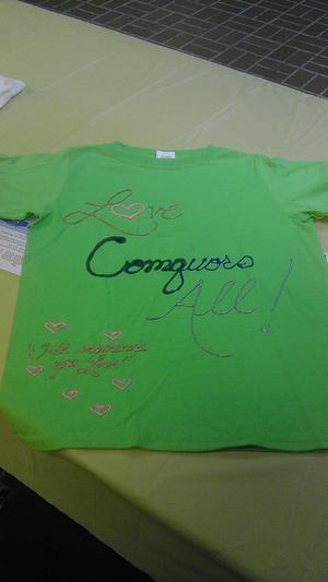 [Message on green Clothesline Project t-shirt]