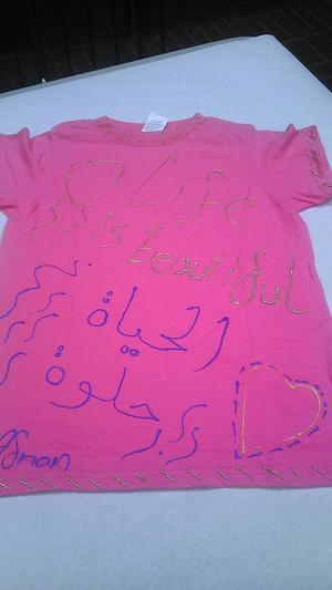 [Message on pink Clothesline Project t-shirt]