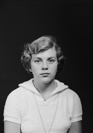 [Young woman sitting for picture]