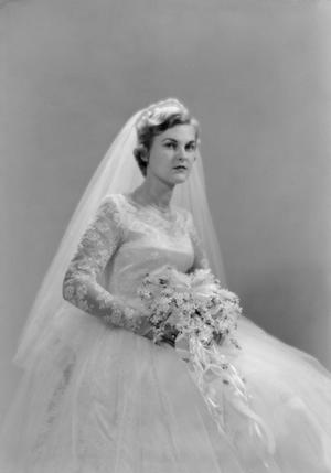 [Portrait of Jane Williams in a wedding dress, holding a bouquet]