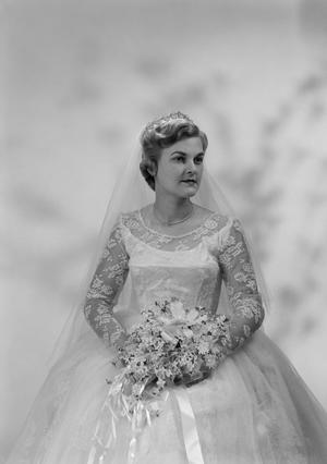 [Portrait of Jane Williams in a wedding dress, holding a bouquet, 2]