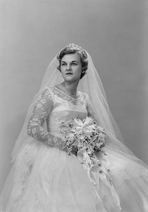 [Portrait of Jane Williams in a wedding dress, holding a bouquet, 4]