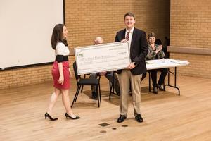 [Kyle McKay holding "Third Place" prize and check at the UNT Music Entrepreneurship Competition Finals]
