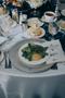 Photograph: ["Enchanted Evening" event program with table setting at the UNT Coll…