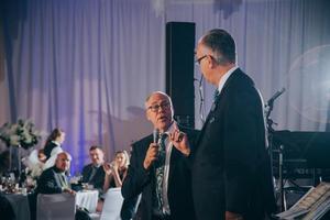 [UNT President Neal Smatresk and Dean of the College of Music John W. Richmond speaking during the reception at the UNT College of Music Gala]