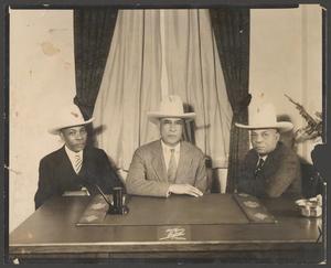 [L. B. Kinchion and two unknown individuals]