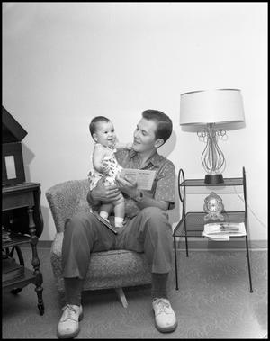 [Photograph of Pat Boone and one of his daughters]