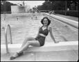 Photograph: [Dorothy Burch Posing by a Pool]