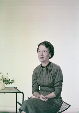 [Portrait of Alice James Foster sitting on a chair and smiling]