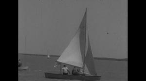 [News Clip: Sail boats race in lake regatta]
