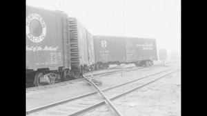[News Clip: Freight Cars are Derailed in Yard]