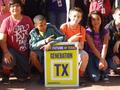 Primary view of [Students holding Generacion TX sign]