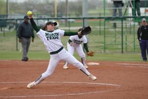 [North Texas softball player pitches during a game, 7]