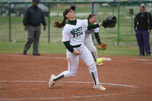 [North Texas softball player pitches during a game, 8]