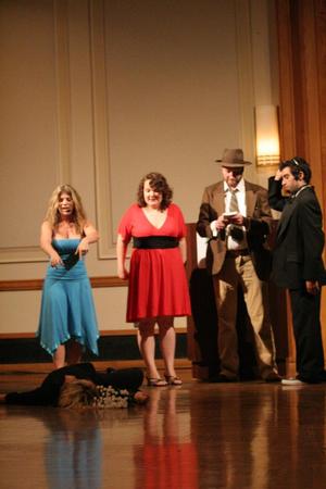[Photograph of five performers at murder mystery dinner]