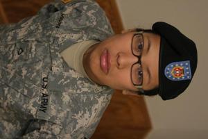 [Photograph of Nina Duong in National Guard uniform]