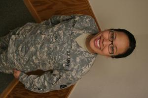[Photograph of Nina Duong smiling in National Guard uniform]