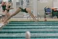 Photograph: [Photograph of Swimming and Diving members diving into water]