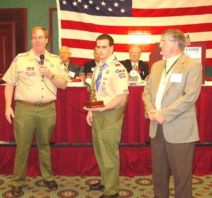 Primary view of object titled '[Eagle Scout receives award at the 109th Annual State Convention]'.