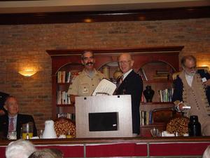 [H. Charles Baker presents award to Boy Scouts at TXSSAR Dallas Chapter event]