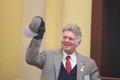 Thumbnail image of item number 1 in: '[John Morton holds Rose Bowl Game cap at TXSSAR Dallas Chapter meeting]'.