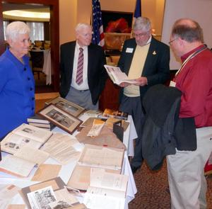[Marye Scantlin and TXSSAR members at memorabilia table during Dallas Chapter meeting]
