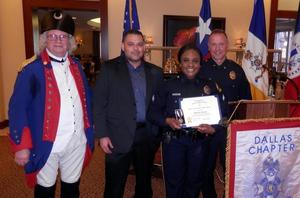Primary view of object titled '[Krystal Woods-Romero receives award at TXSSAR Dallas Chapter meeting]'.