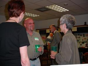[Three faculty members converse at Willis Library new faculty reception, 3]