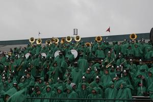 [North Texas Green Brigade Marching Band in the stands at football game, 2]
