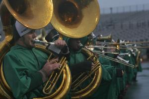 [Sousaphone players performing at a football game, 2]