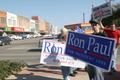 Photograph: [Photograph of a group holding Ron Paul signs on the Square 2]