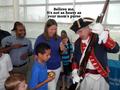 Photograph: [TXSSAR member displays musket at naturalization ceremony: September …