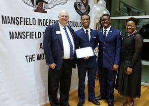 [John Anderson with students at JROTC awards event, April 2019]