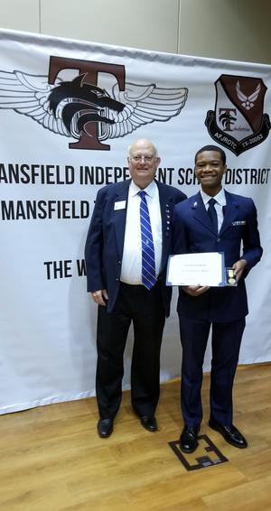 [John Anderson and student at JROTC awards event, April 2019]