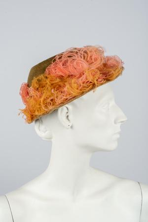Cloche hat with feathers