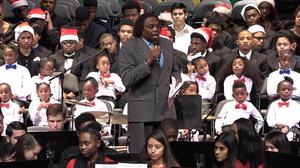 [Curtis King speaks at 23rd annual Christmas Kwanzaa concert]