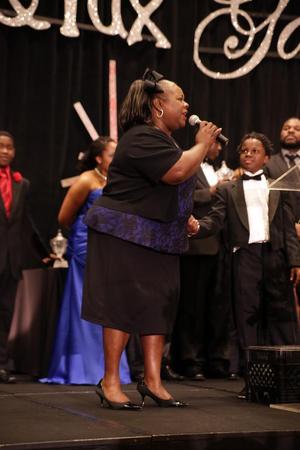 [Cassi Davis on stage with Terrance Dean, Ties and Tux 2014, 3]