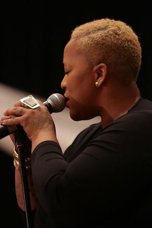 [Frenchie Davis performs at Ties and Tux 2014, closeup 1]