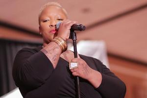 [Frenchie Davis performs at Ties and Tux 2014, closeup 2]