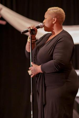 [Frenchie Davis performs at Ties and Tux 2014]