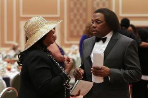 [Curtis King and Barbara Steele converse at Ties and Tux 2014]